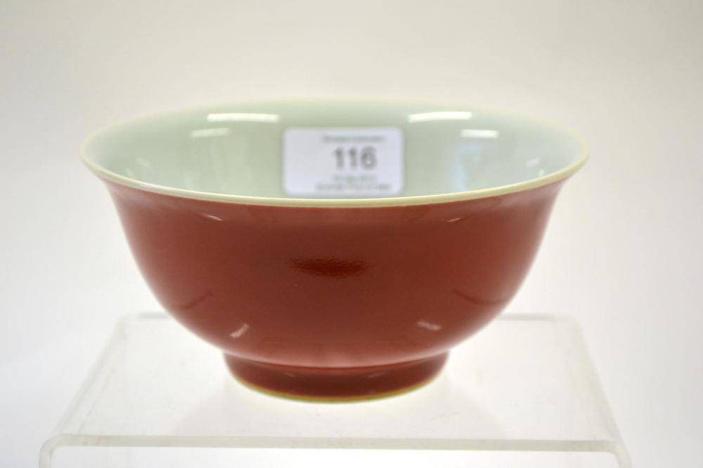 Lot 116 - A Chinese Porcelain Coral Ground Bowl, bears Yongzheng reign mark, of circular room with...
