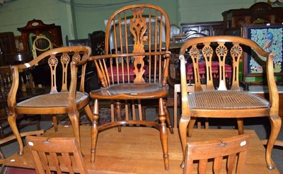 Lot 703 - A Windsor armchair and a pair of cane seated bow armchairs