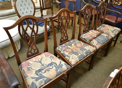 Lot 711 - Four Georgian mahogany splat back chairs