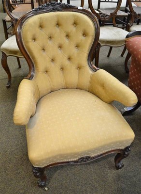 Lot 719 - A Victorian rosewood framed button back armchair