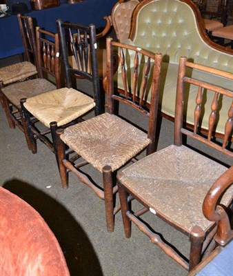 Lot 723 - Five oak framed cottage chairs with rush woven seats