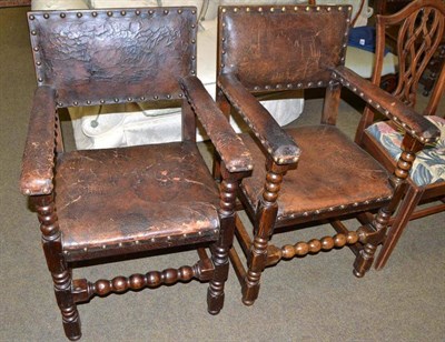 Lot 726 - Pair of oak framed leather upholstered open armchairs