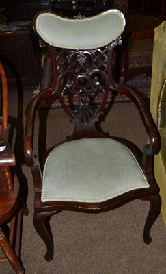 Lot 731 - An Edwardian carved mahogany chair