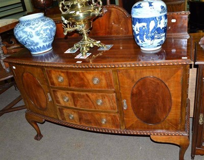 Lot 753 - An early 20th century mahogany bow front sideboard