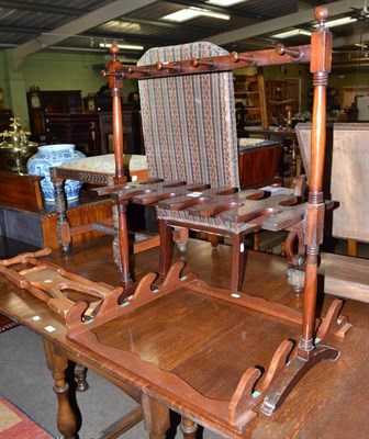 Lot 757 - A Victorian mahogany boot rack, a pine boot jack and a modern whip stand