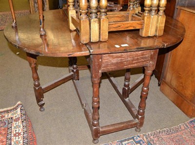 Lot 764 - Oak oval drop leaf gateleg table