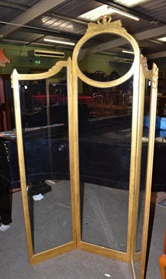 Lot 776 - A glazed gilt wood three leaf screen