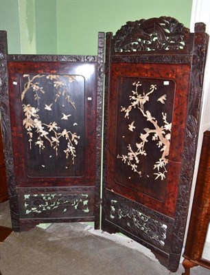 Lot 777 - A Japanese ebonised wood and lacquer two leaf screen with bone applique