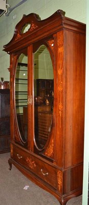 Lot 778 - An Edwardian inlaid double wardrobe