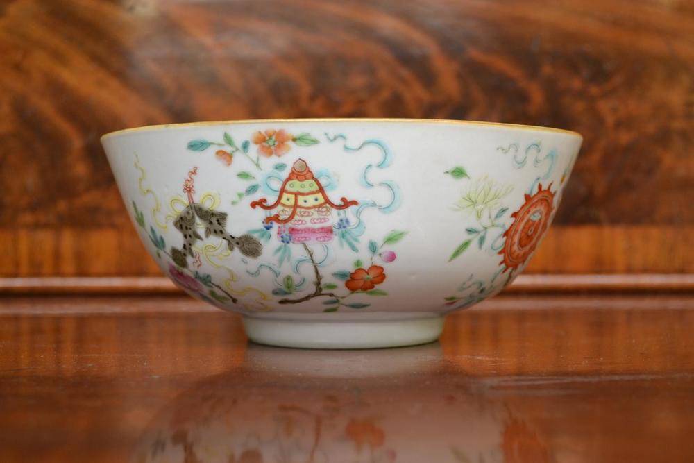 Lot 125 - A Chinese Porcelain Bowl, Daoguang mark and probably of the period, painted in famille rose enamels