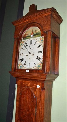 Lot 787 - A 19th century oak eight day longcase clock, with painted arched dial