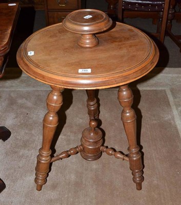 Lot 789 - 19th century turned elm three legged table