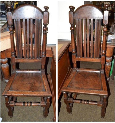 Lot 804 - A pair of late 17th century English joined oak back stools, with arched top rails and moulded...