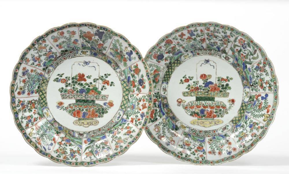Lot 129 - A Pair of Chinese Porcelain Chargers, Kangxi, of fluted circular form, painted in famille verte...
