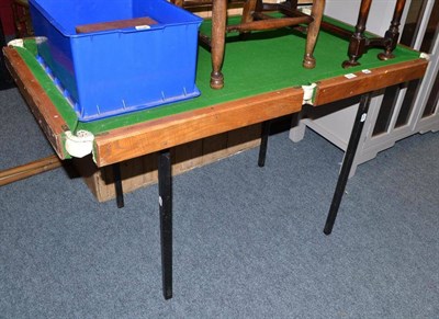 Lot 832 - A miniature snooker table on metal stand together with balls and accessories