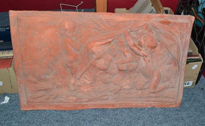 Lot 835 - Terracotta plaque depicting cherubs