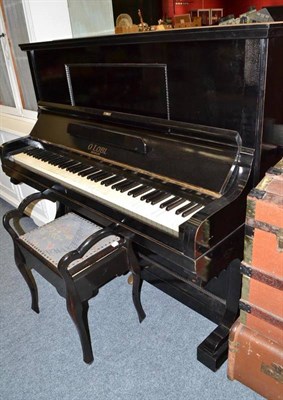 Lot 838 - O Lobl Berlin ebonised upright piano and a similar piano stool