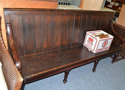 Lot 848 - A Victorian open arm hall bench