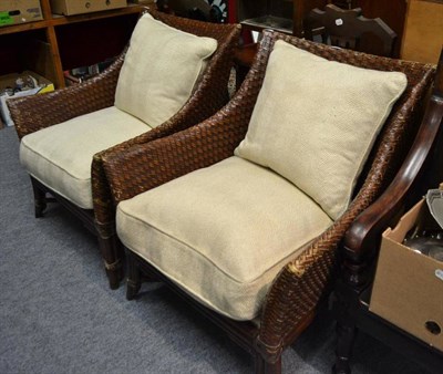 Lot 849 - Pair of bamboo framed leather upholstered open armchairs