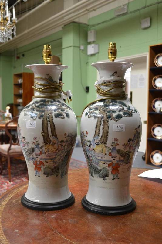 Lot 134 - A Pair of Chinese Porcelain Baluster Vases, in 18th century style, with trumpet necks, painted...