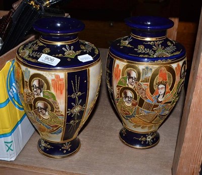 Lot 906 - A pair of Japanese baluster vases