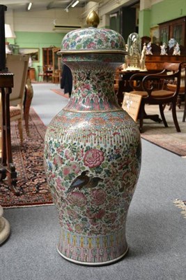 Lot 137 - A Chinese Porcelain Baluster Jar and Cover, painted in famille rose enamels with birds amongst...