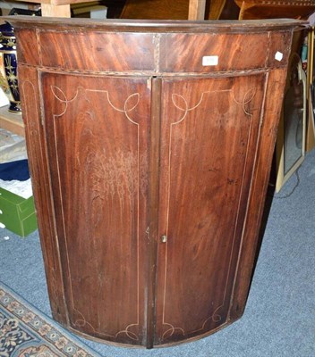 Lot 916 - 18th century bow front corner cupboard