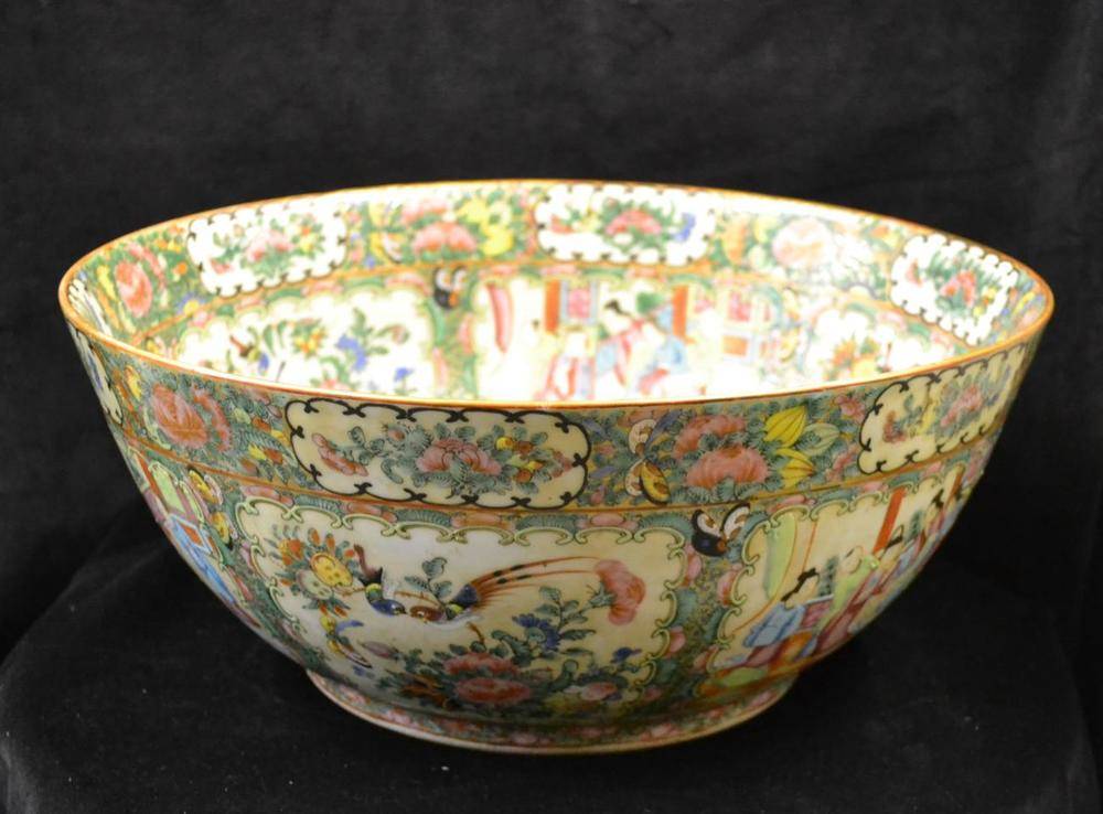 Lot 142 - A Cantonese Porcelain Punch Bowl, mid 19th century, typically painted in famille rose enamels...