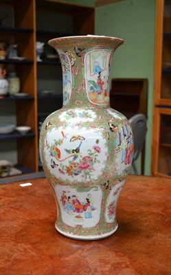 Lot 143 - A Cantonese Porcelain Baluster Vase, mid 19th century, with trumpet neck, painted in famille...