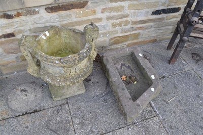 Lot 988 - A stone trough and a reclaimed stone urn on stand