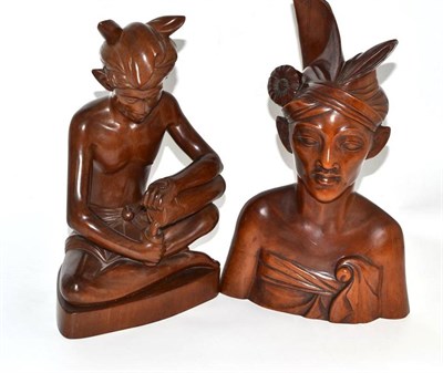 Lot 1 - Two carved hardwood busts stamped 'Bali'