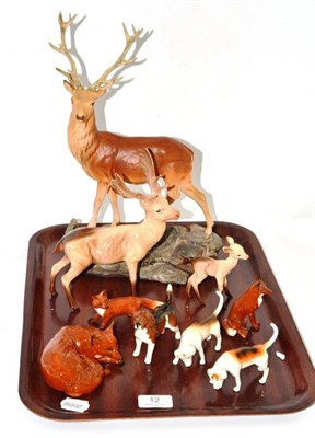 Lot 12 - Beswick matt figure of a stag, gloss figure of a deer and buck, Beswick seated fox, two others...