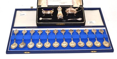 Lot 63 - A cased set of twelve 'Roman' spoons designed by David Cornell and a cased silver condiment set