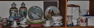 Lot 69 - Two shelves of decorative ceramics including a set of eleven Franklin Porcelain plates...