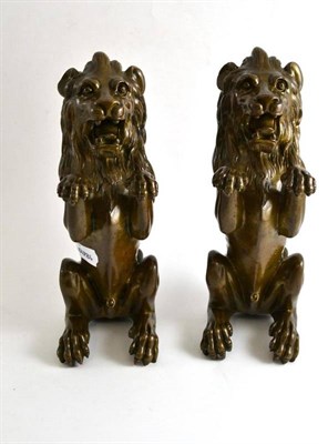 Lot 92 - Pair of bronzed standing lions