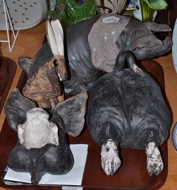 Lot 104 - Jeremy James pottery sculpture of a seated hare, Christine Cummings pottery seated pig and...