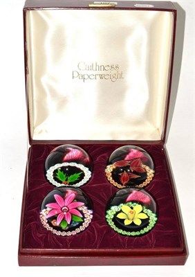Lot 107 - Four Caithness limited edition glass paperweights 'The Four Seasons', in a fitted case
