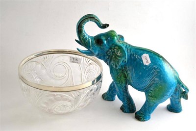 Lot 115 - A cut glass bowl with silver mount and a turquoise glazed model of an elephant