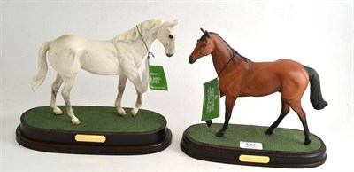Lot 132 - Two Royal Doulton horses; 'Red Rum', style one, model No. DA18, on wood plinth with box;...
