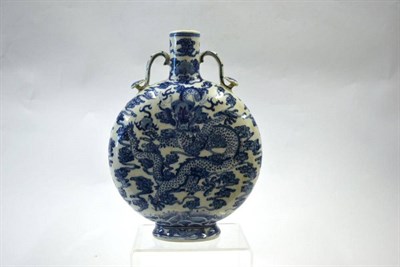 Lot 159 - A Chinese Porcelain Moon Flask, bears Qianlong reign mark, with ruyi sceptre handles, painted...