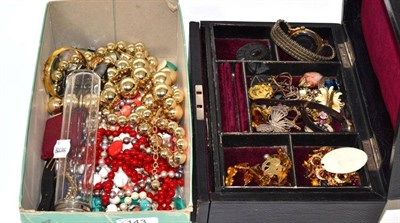 Lot 143 - Black leather mounted jewellery case including paste set oval buckle, jet brooch, costume jewellery