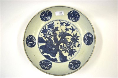 Lot 160 - A Chinese Porcelain Saucer Dish, probably Jiajaing period, painted in underglaze blue with a...