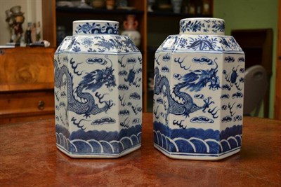 Lot 161 - A Pair of Chinese Porcelain Hexagonal Jars and Covers, 19th century, with sloping shoulders,...