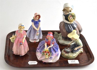 Lot 157 - A Lladro figure of a young girl with basket of flowers and four small Royal Doulton figure...