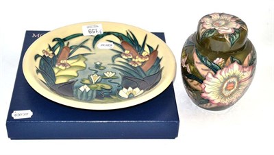 Lot 159 - Modern Moorcroft ginger jar and cover and a large cabinet plate (2)