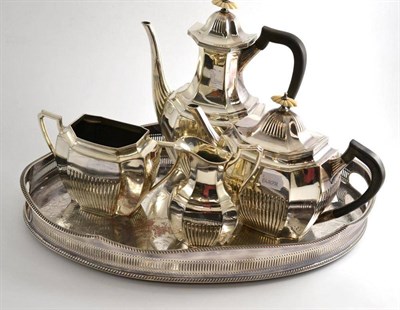 Lot 171 - A four piece Elkington silver plated tea service with silver plated tray