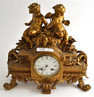 Lot 178 - Gilt metal mounted mantel clock decorated with cherubs