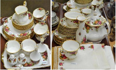 Lot 180 - Royal Albert Old English Rose pattern thirty-eight piece tea service with matching table cloth...