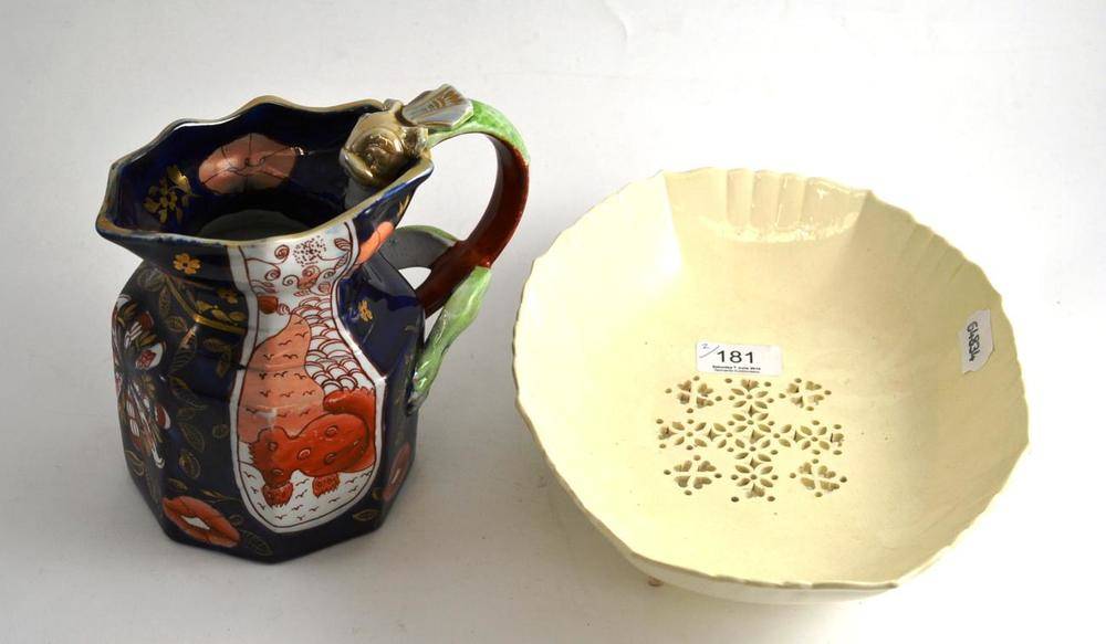 Lot 181 - Masons ironstone jug and a creamware strainer dish (2)