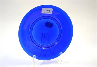 Lot 166 - A Peking Blue Glass Plate, 19th century, of circular form, 19.5cm diameter